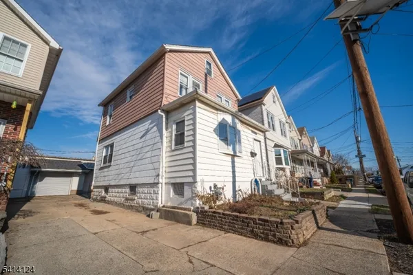 a view of a building with barbeque grill and stairs