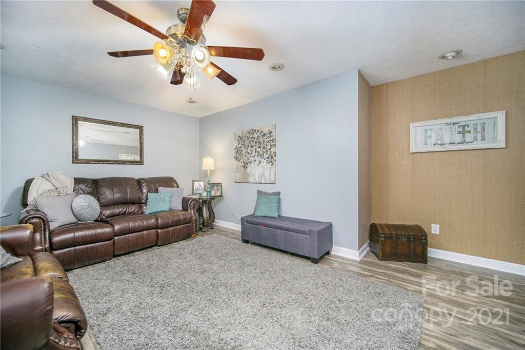 833 Long Branch Road Grover, NC 28073 - Photo 13 of 29 a living room with furniture and a ceiling fan