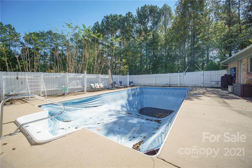 833 Long Branch Road Grover, NC 28073 - Photo 23 of 29 a view of a swimming pool with a patio