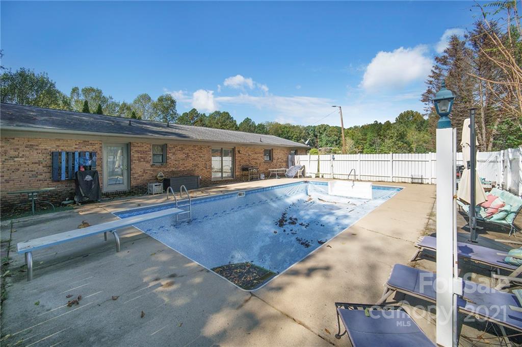 833 Long Branch Road Grover, NC 28073 - Photo 25 of 29 a view of a house with a swimming pool
