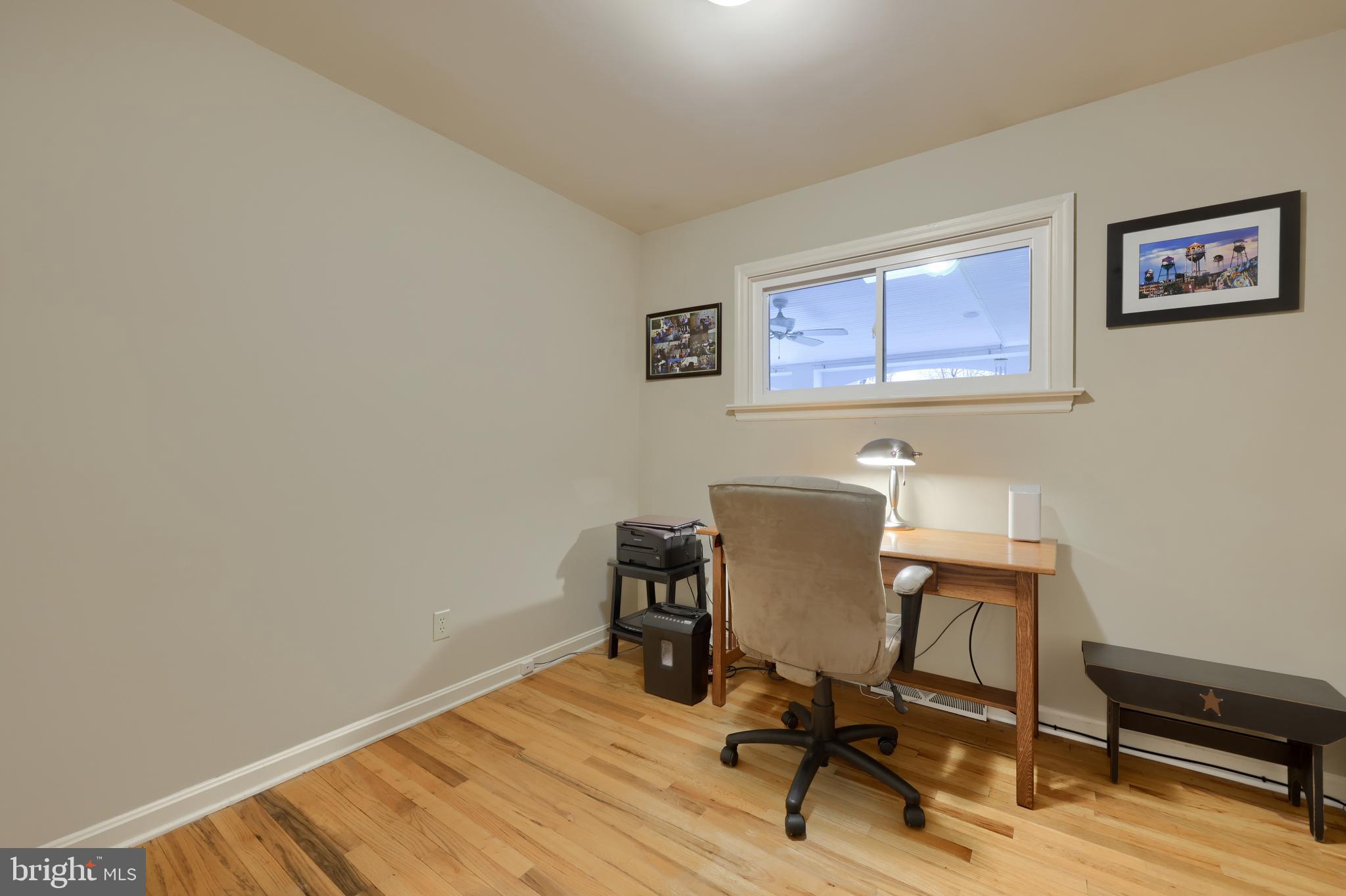 142 St Thomas Road Lancaster, PA 17601 - Photo 33 of 58 a view of a workspace with furniture and wooden floor