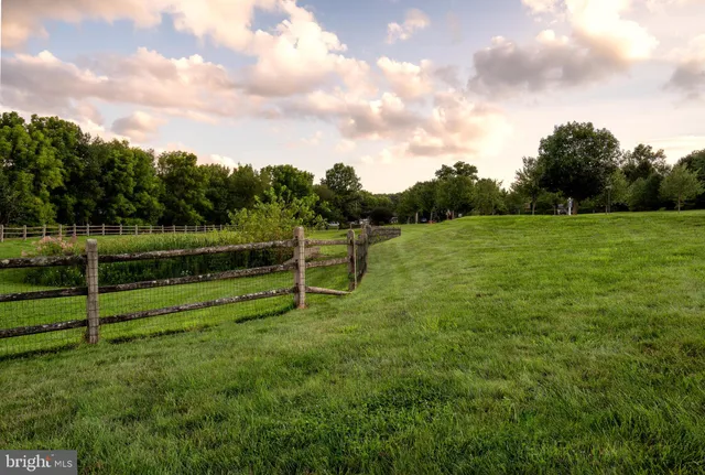 a view of a golf course with a lake