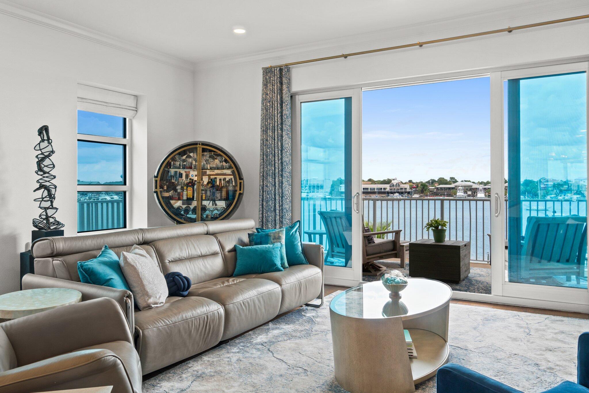 211 Durango Road, Unit 311 Destin, FL 32541 - Photo 11 of 71 a living room with furniture and a large window