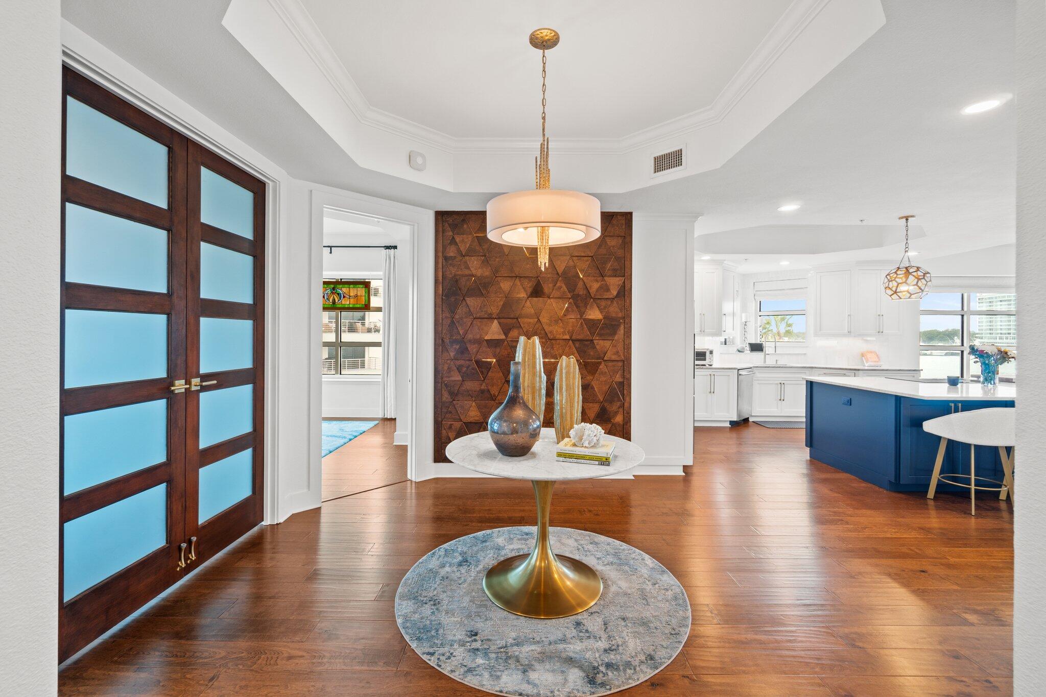 211 Durango Road, Unit 311 Destin, FL 32541 - Photo 2 of 71 a living room with furniture and a wooden floor