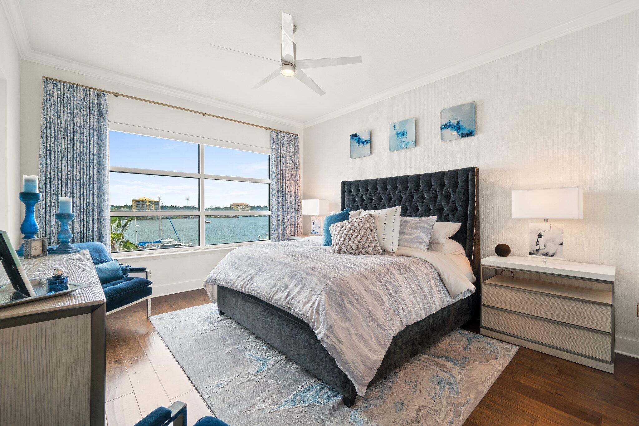 211 Durango Road, Unit 311 Destin, FL 32541 - Photo 21 of 71 a bedroom with a large bed and a large window