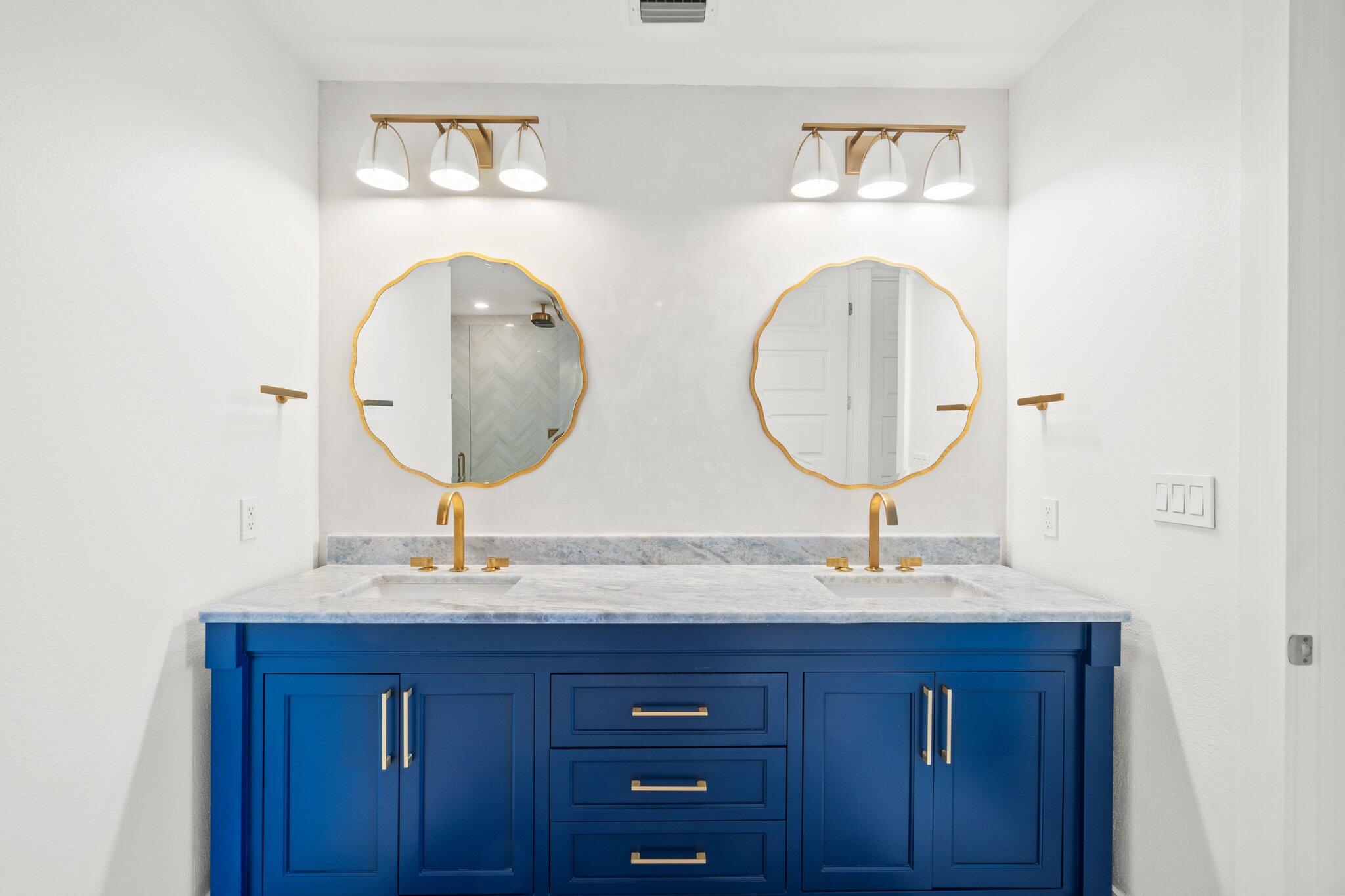 211 Durango Road, Unit 311 Destin, FL 32541 - Photo 24 of 71 a bathroom with 2 sink and a mirror