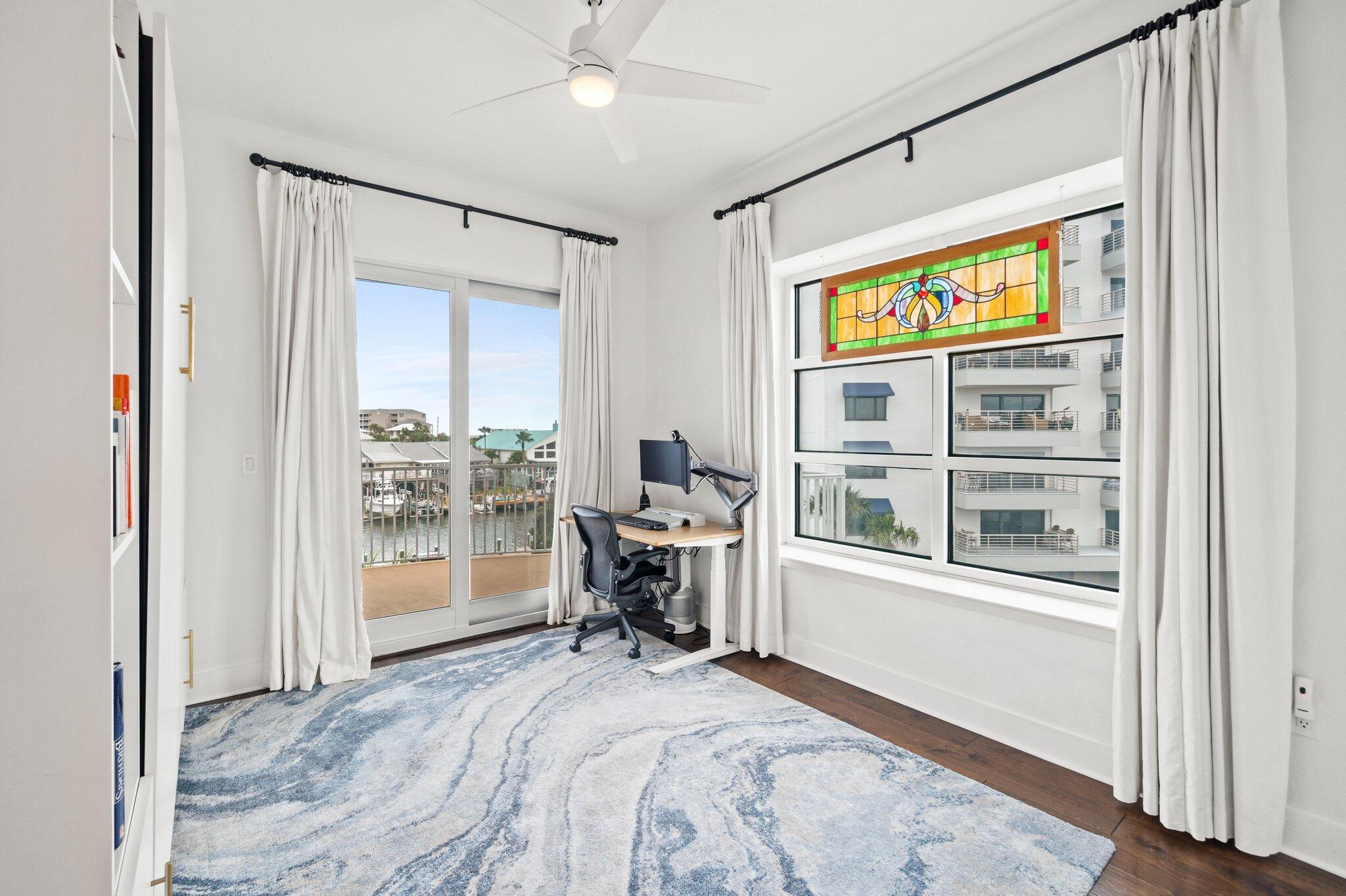 211 Durango Road, Unit 311 Destin, FL 32541 - Photo 28 of 71 a bed room with a bed and a window