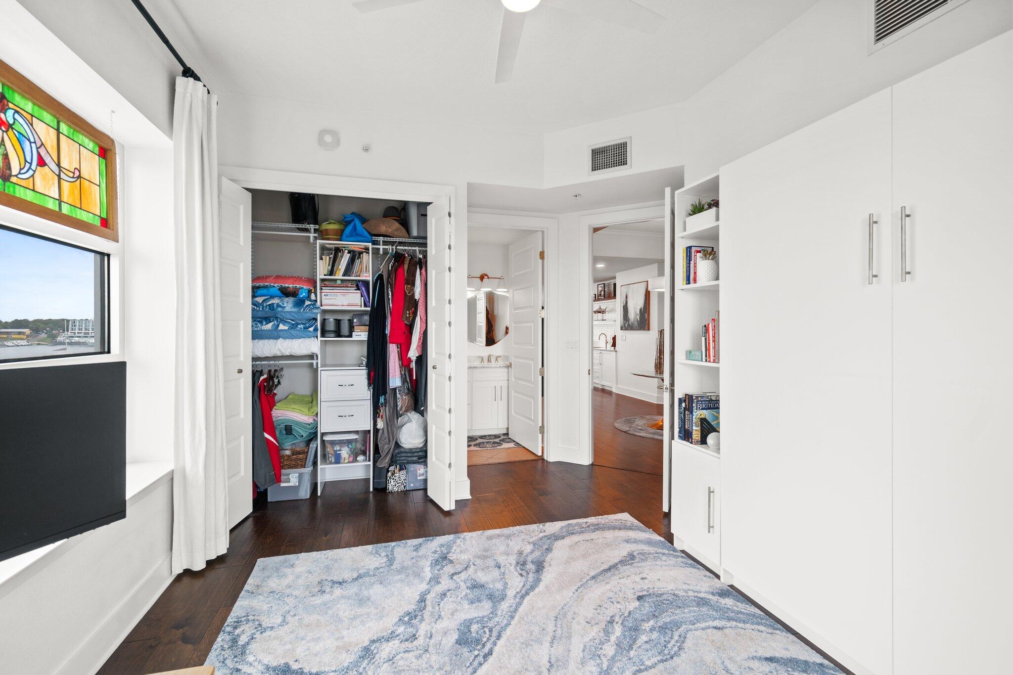 211 Durango Road, Unit 311 Destin, FL 32541 - Photo 29 of 71 a bedroom with furniture and a window