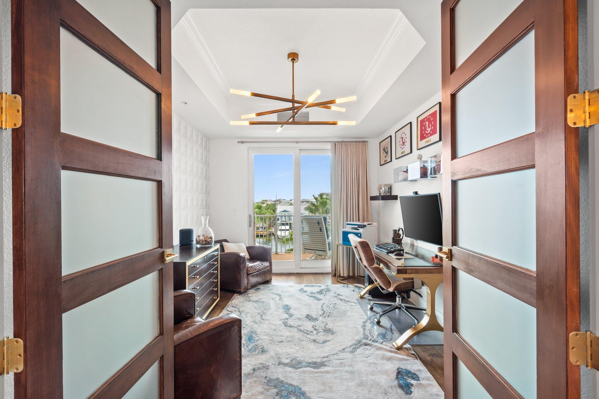 211 Durango Road, Unit 311 Destin, FL 32541 - Photo 33 of 71 a view of a workspace with furniture and a window