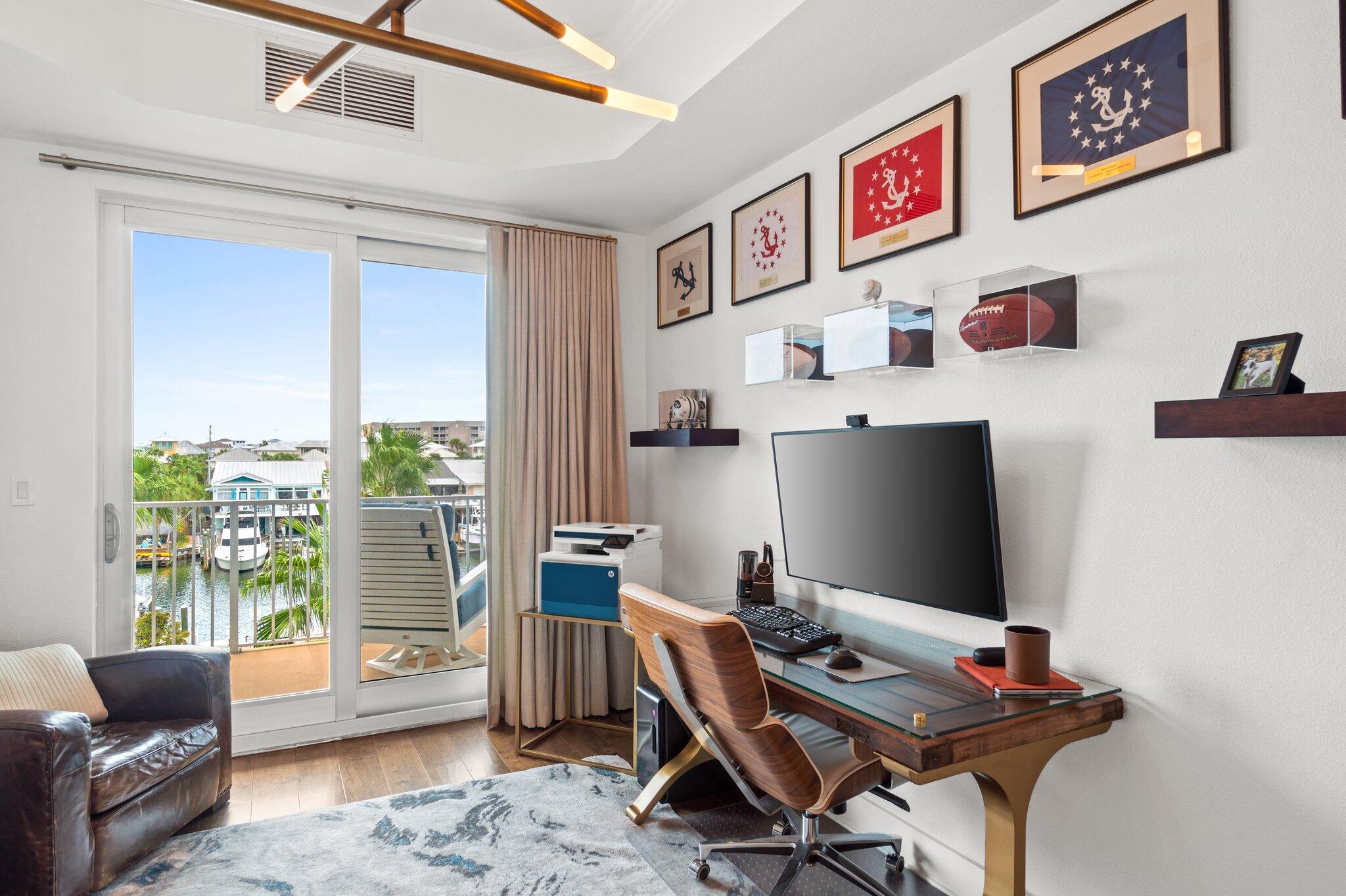 211 Durango Road, Unit 311 Destin, FL 32541 - Photo 34 of 71 a workspace with furniture and a window