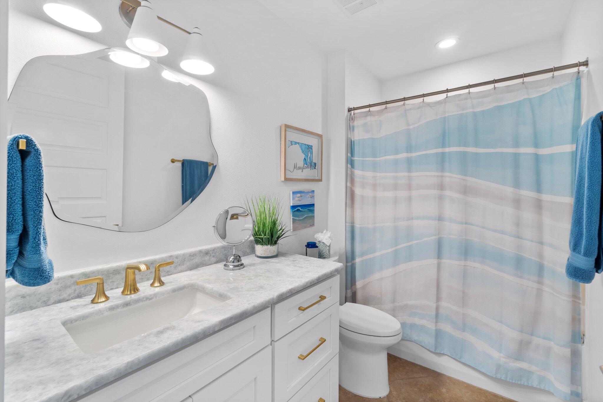 211 Durango Road, Unit 311 Destin, FL 32541 - Photo 38 of 71 a bathroom with a granite countertop sink toilet and shower
