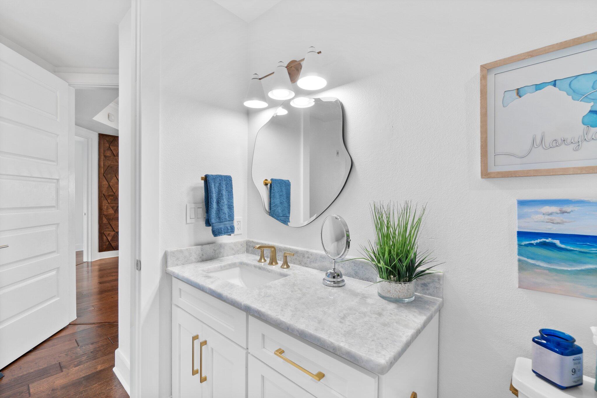 211 Durango Road, Unit 311 Destin, FL 32541 - Photo 39 of 71 a bathroom with a sink and a mirror