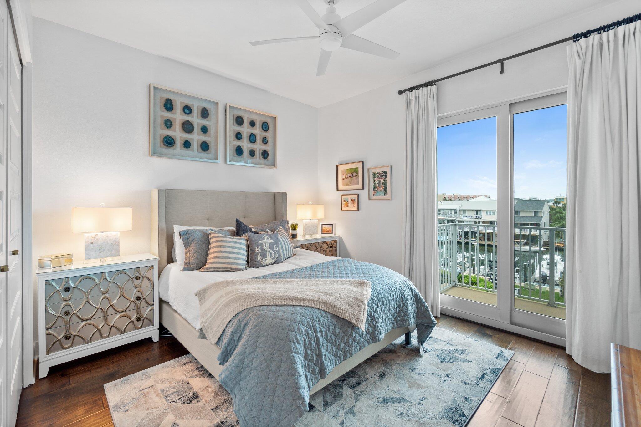 211 Durango Road, Unit 311 Destin, FL 32541 - Photo 40 of 71 a bedroom with a large bed and a window