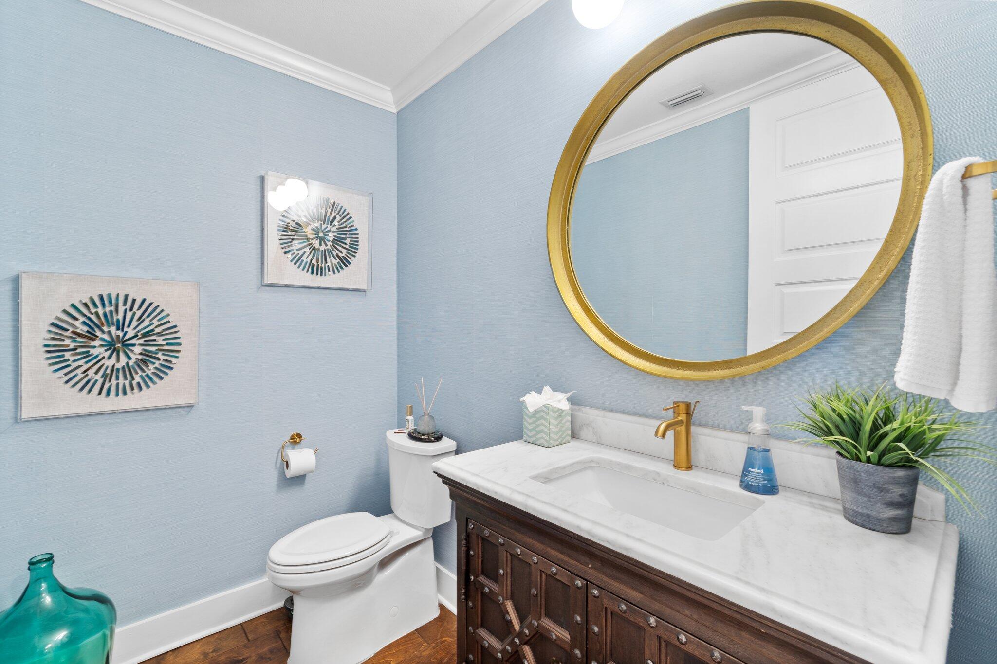 211 Durango Road, Unit 311 Destin, FL 32541 - Photo 43 of 71 a bathroom with a sink a mirror and a toilet