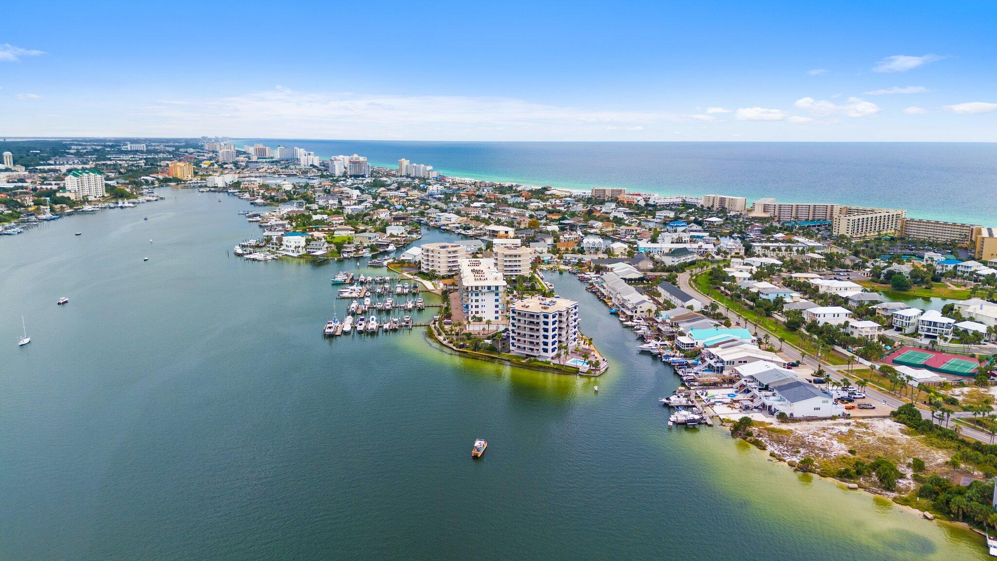 211 Durango Road, Unit 311 Destin, FL 32541 - Photo 56 of 71 an aerial view of ocean and residential houses with outdoor space