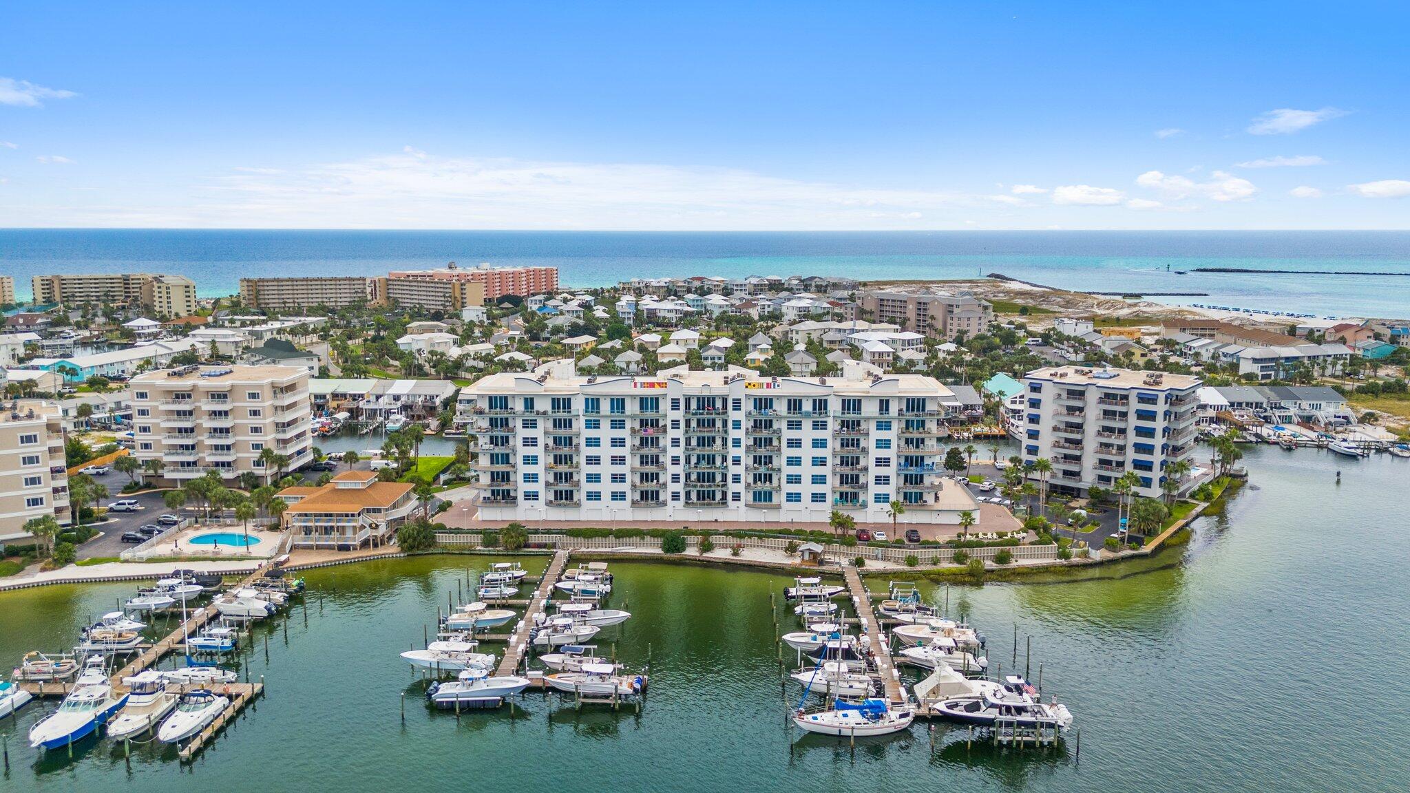 211 Durango Road, Unit 311 Destin, FL 32541 - Photo 62 of 71 an aerial view of water body with boats and trees all around