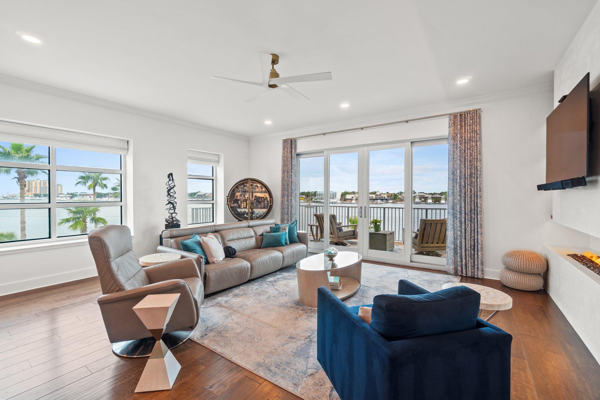 211 Durango Road, Unit 311 Destin, FL 32541 - Photo 8 of 71 a living room with furniture and a large window