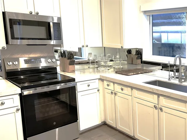 a bedroom with a bed and a fireplace