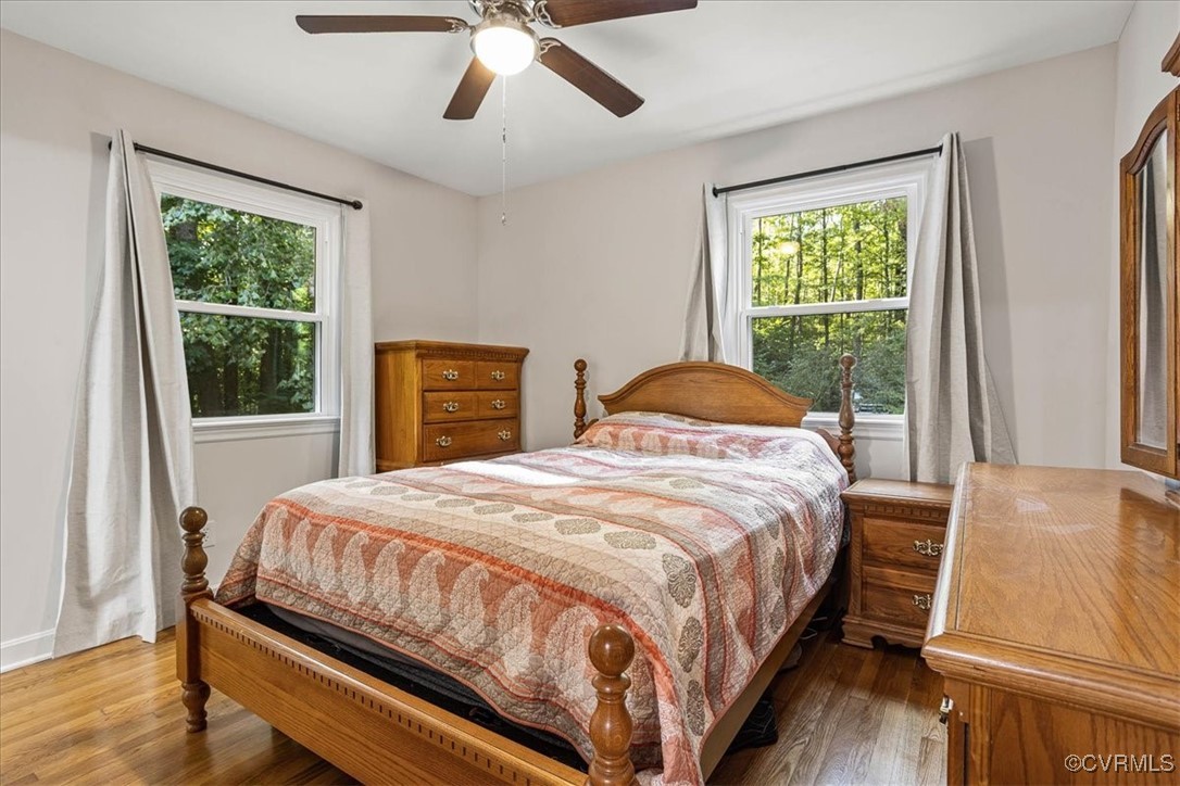 6314 Heritage Road Prince George, VA 23875 - Photo 15 of 26 Bedroom with hardwood / wood-style flooring and ce