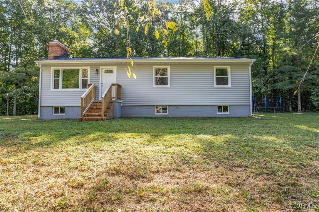 6314 Heritage Road Prince George, VA 23875 - Photo 2 of 26 Raised ranch featuring a trampoline and a front ya