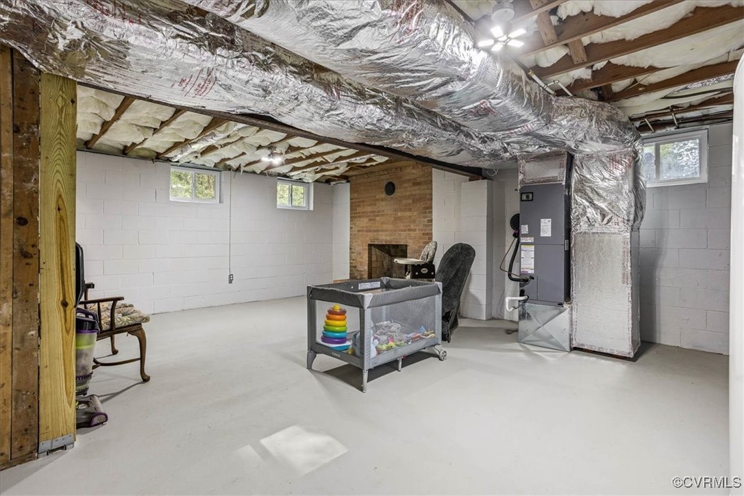 6314 Heritage Road Prince George, VA 23875 - Photo 26 of 26 Basement with plenty of natural light, a fireplace