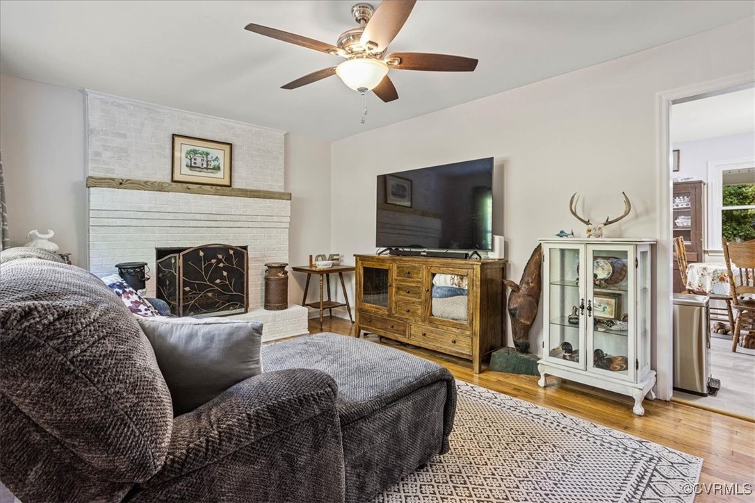 6314 Heritage Road Prince George, VA 23875 - Photo 5 of 26 Living room featuring light wood-type flooring, a