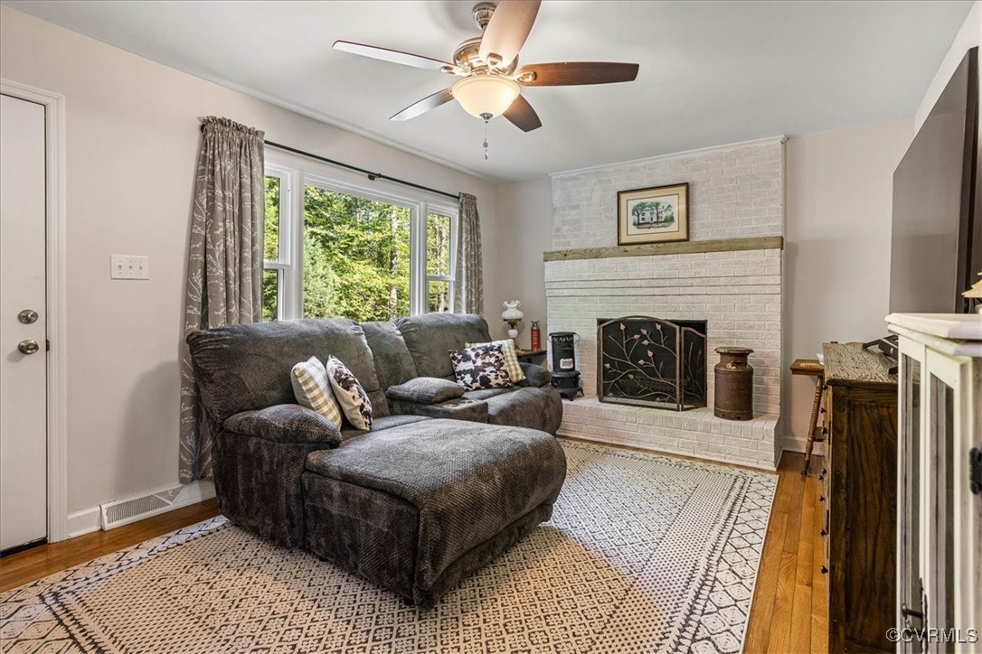 6314 Heritage Road Prince George, VA 23875 - Photo 8 of 26 Living room featuring ceiling fan, hardwood / wood