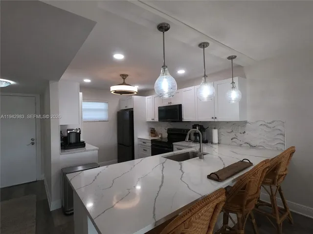 $179,900 | 3930 Inverrary Boulevard, Unit 604D, Lauderhill, FL 33319