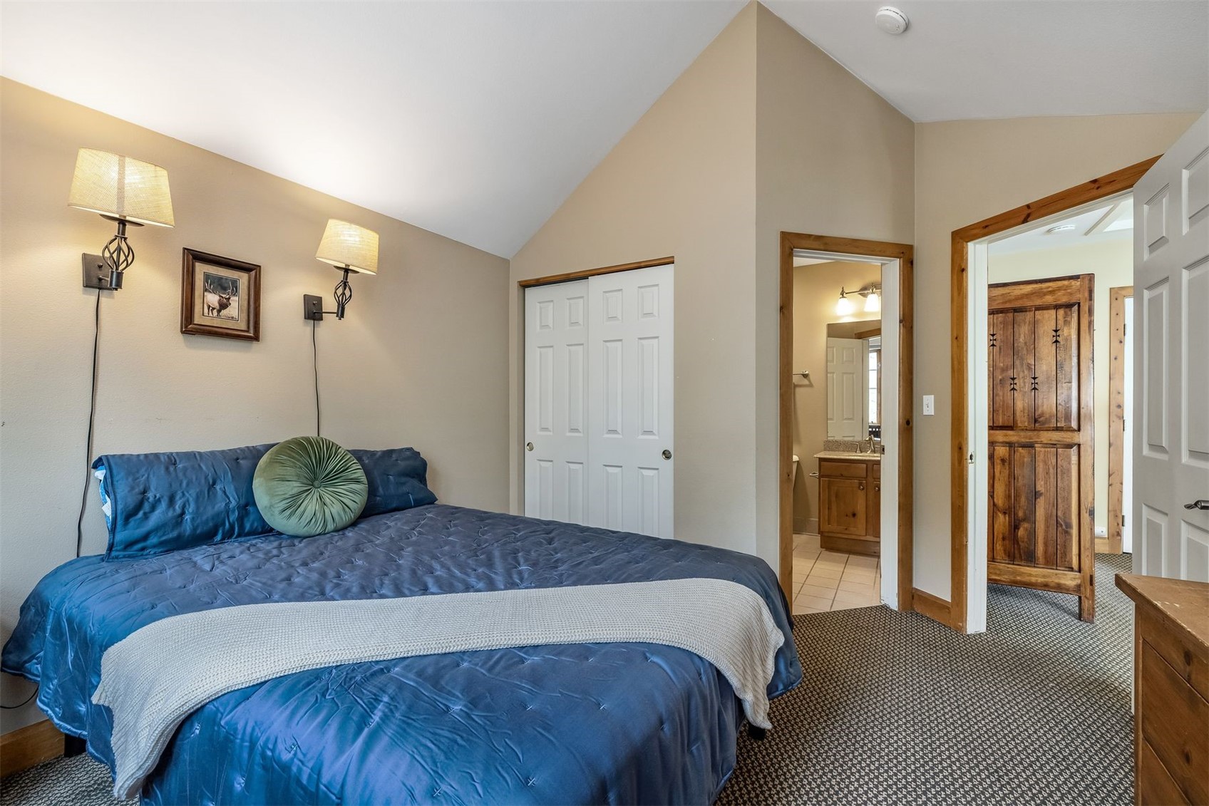 71 Starfire Lane, Unit 1978 Keystone, CO 80435 - Photo 22 of 40 a bedroom with a bed and a closet