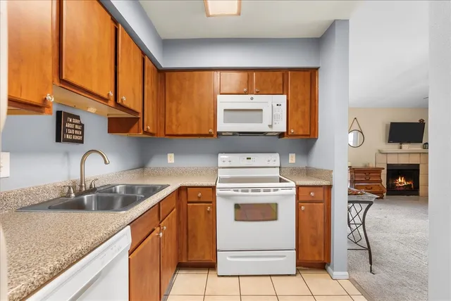a kitchen with a stove and a sink