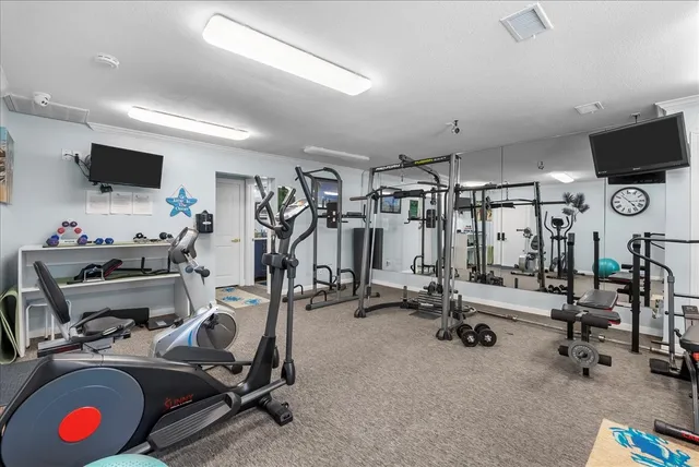 a view of a room with gym equipment