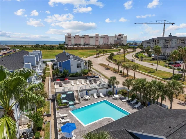 a view of a city with lawn chairs