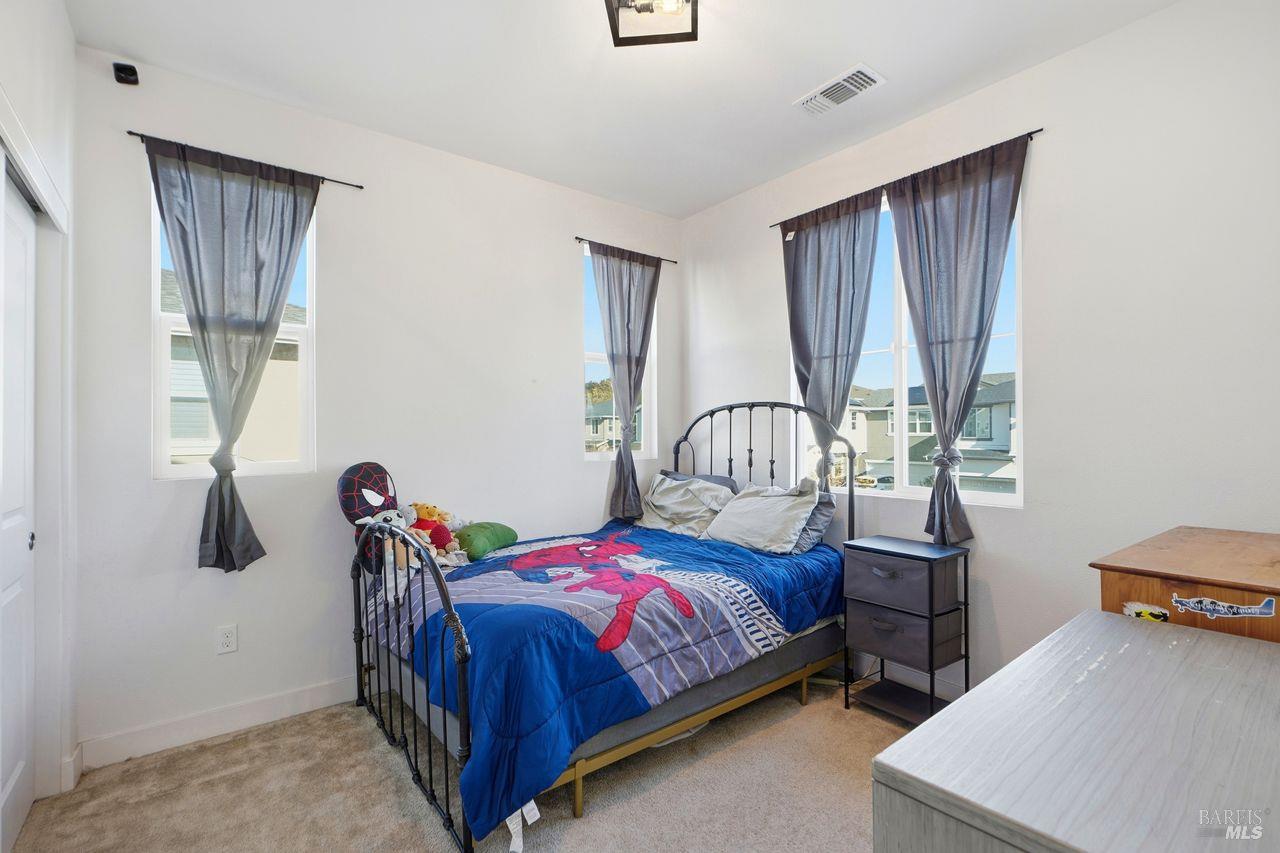 1617 Sorrel Street Santa Rosa, CA 95403 - Photo 20 of 29 a bedroom with a bed and a window