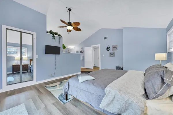 a bedroom with a bed and window