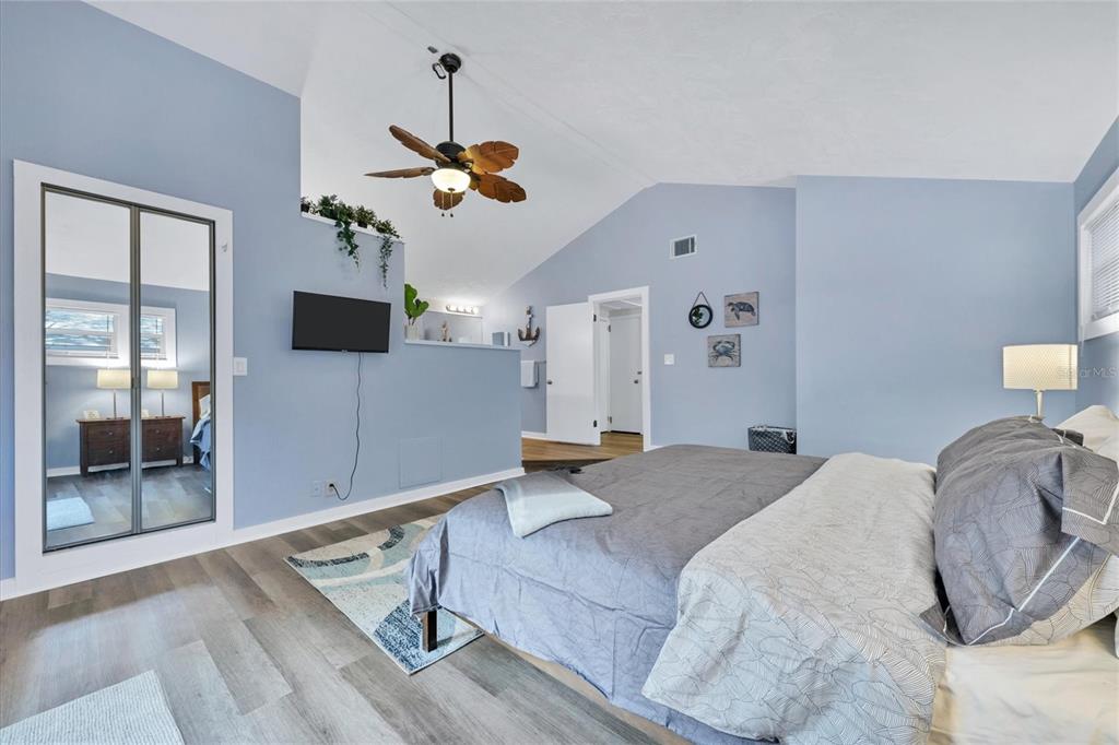 900 Beverly Avenue Northwest Largo, FL 33770 - Photo 17 of 32 a bedroom with a bed and window