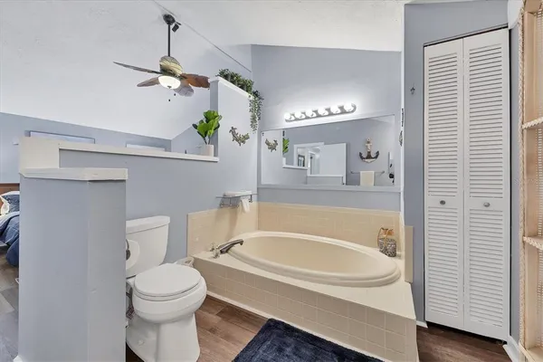 a bathroom with a sink a bathtub and a toilet