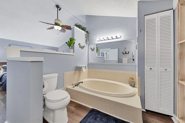 a bathroom with a sink a bathtub and a toilet
