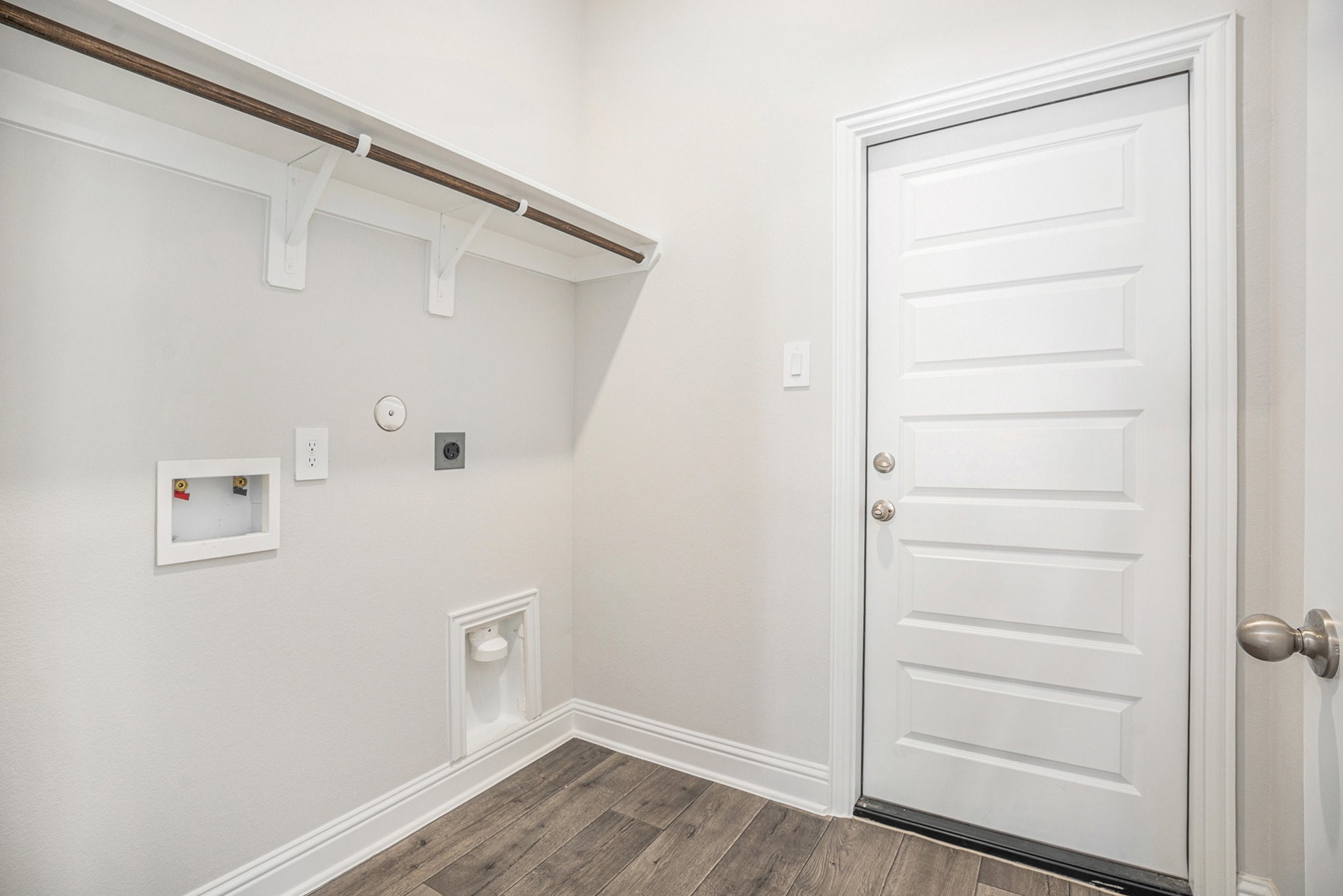 408 Bryan Street Angleton, TX 77515 - Photo 16 of 17 a view of walk in closet with empty racks
