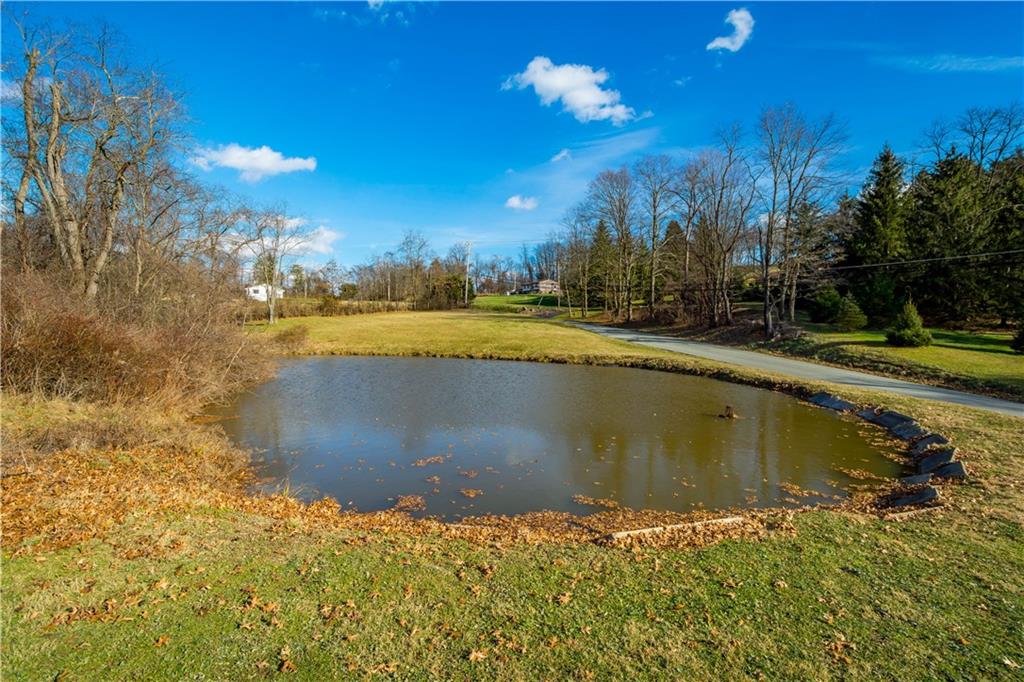 279 Hamtom Road Eighty Four, PA 15330 - Photo 20 of 25 a view of a lake with an outdoor space
