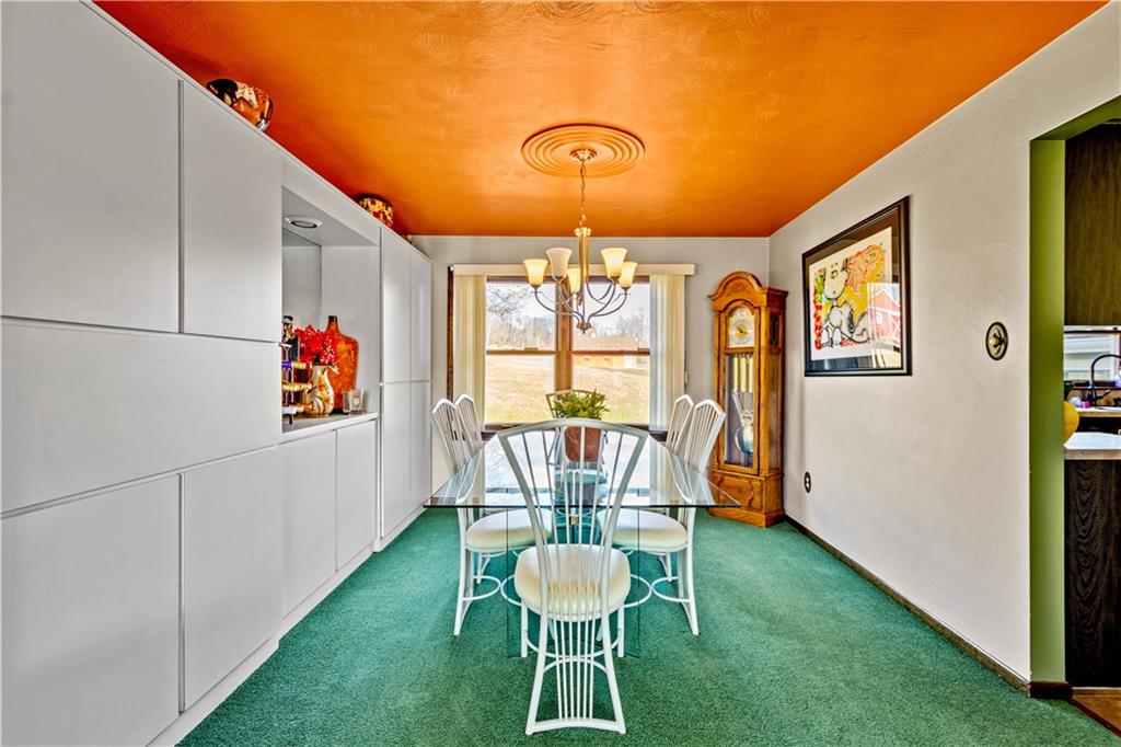 279 Hamtom Road Eighty Four, PA 15330 - Photo 6 of 25 a dining room with furniture and a chandelier