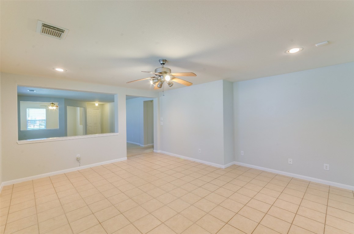 3302 Legends Landing Drive Spring, TX 77386 - Photo 18 of 48 a view of an empty room with chandelier fan