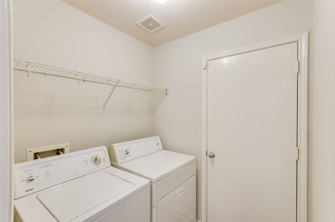 3302 Legends Landing Drive Spring, TX 77386 - Photo 27 of 48 a utility room with dryer and washer