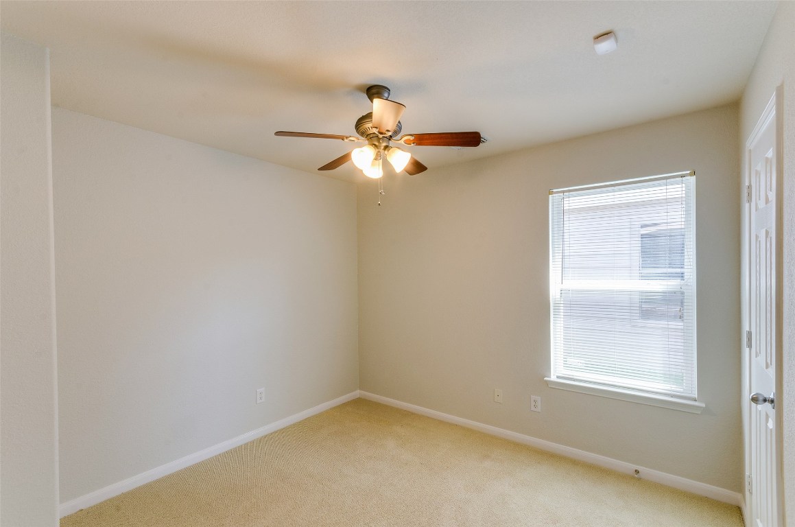 3302 Legends Landing Drive Spring, TX 77386 - Photo 28 of 48 a view of an empty room with a window