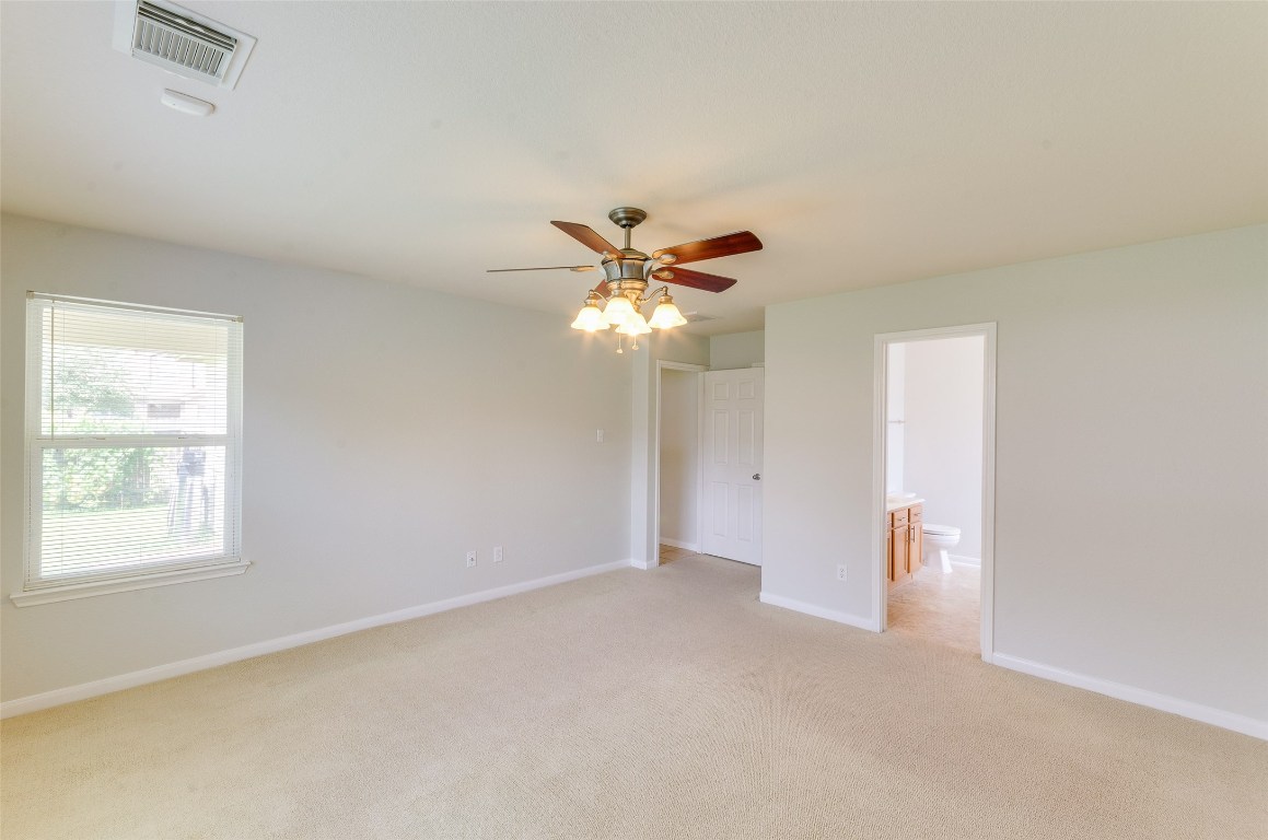3302 Legends Landing Drive Spring, TX 77386 - Photo 42 of 48 a view of an empty room with a ceiling fan