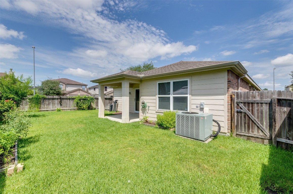 3302 Legends Landing Drive Spring, TX 77386 - Photo 44 of 48 a view of a house with backyard and porch