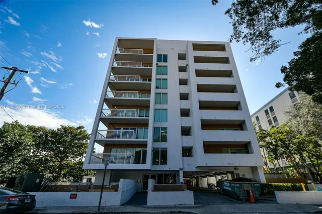 a front view of a building with street view
