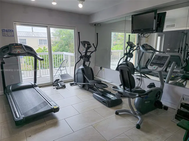 a view of a room with gym equipment