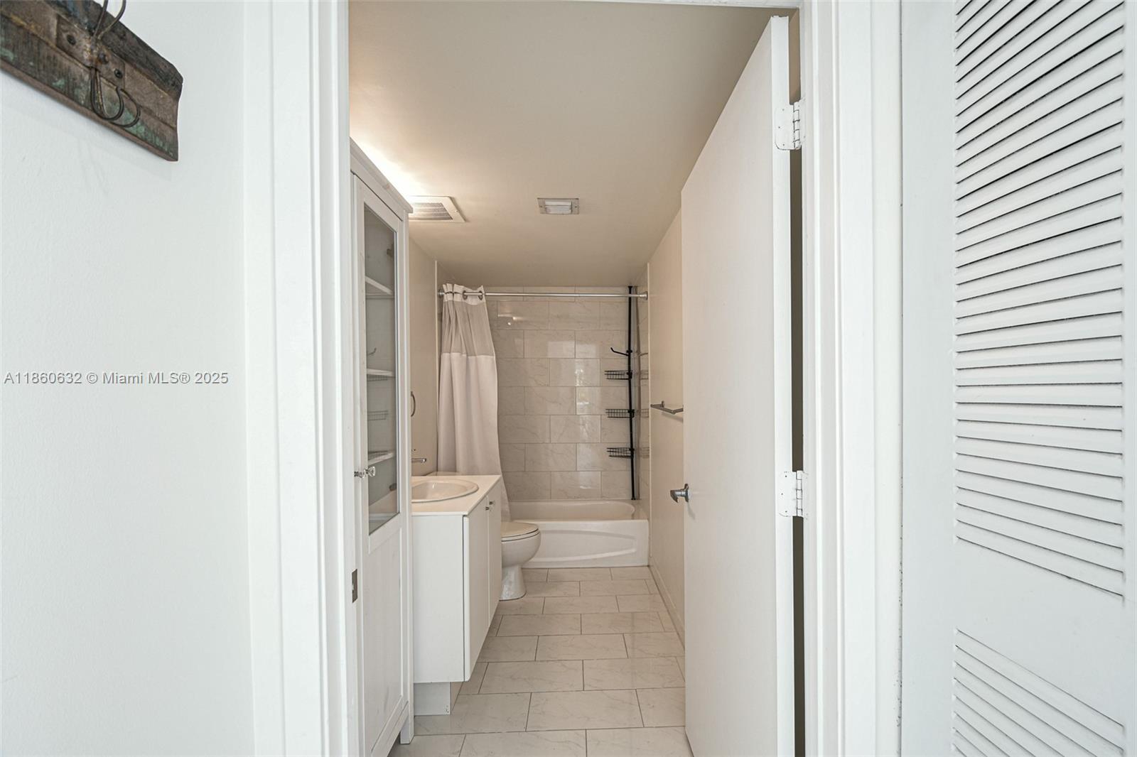 2740 Southwest 28th Terrace, Unit 201 Miami, FL 33133 - Photo 9 of 15 a view of a hallway