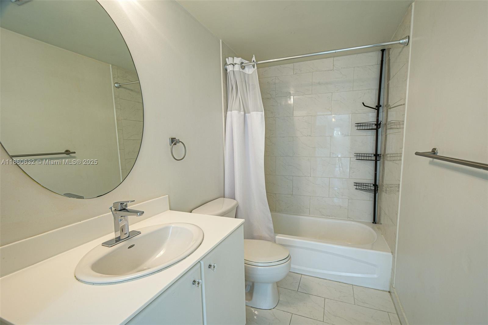 2740 Southwest 28th Terrace, Unit 201 Miami, FL 33133 - Photo 10 of 15 a bathroom with a sink toilet and shower