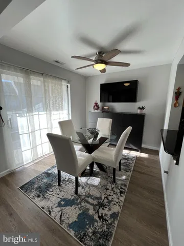 a view of a dining room with furniture